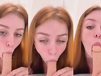 Sara Apollo chupando uma pica de borracha