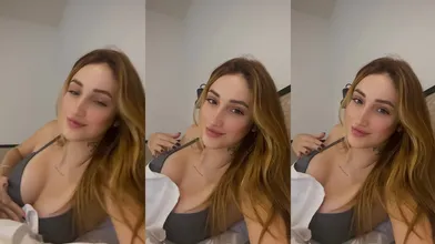 Mama Furtado deitada na cama provocando